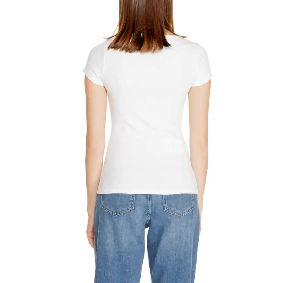 Back view of Guess Women Knitwear: White t-shirt paired with blue jeans