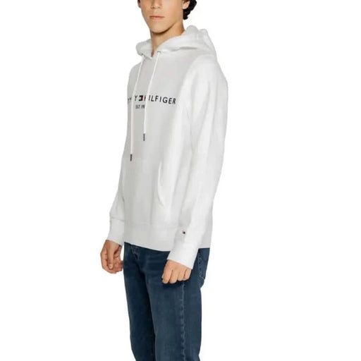 White Tommy Hilfiger hoodie featuring logo text on the chest for men