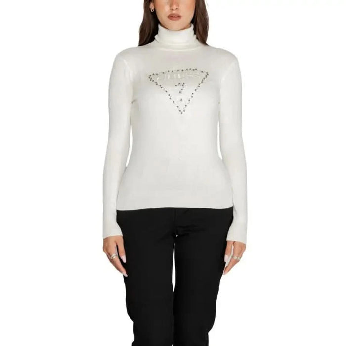 White turtleneck sweater with triangular studs from Guess Women Knitwear collection