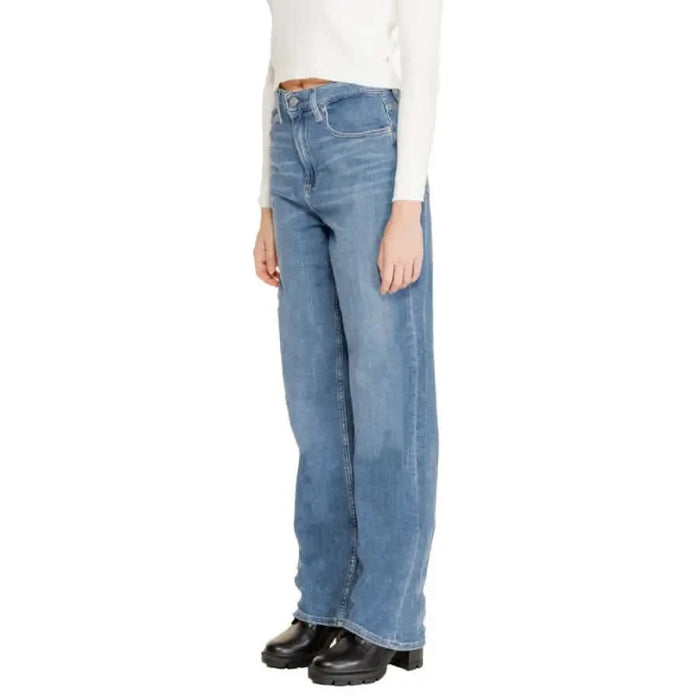 Wide-leg blue jeans by Calvin Klein featuring convenient pockets for women’s fashion