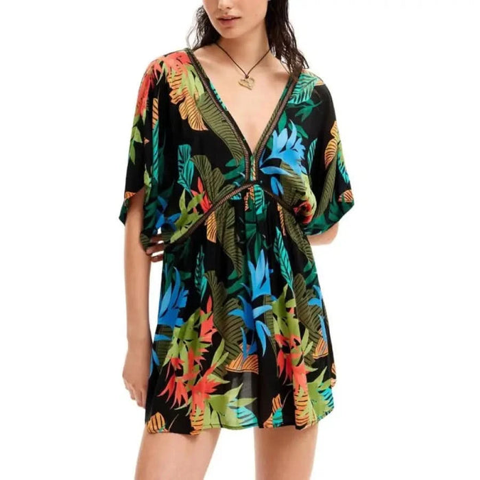 Woman in black and green tropical print dress - Desigual Women’s Urban Style Clothing