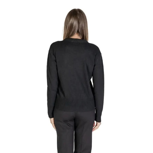 Woman in black sweater and pants showcasing Alviero Martini Prima Classe Women’s Knit Sweater