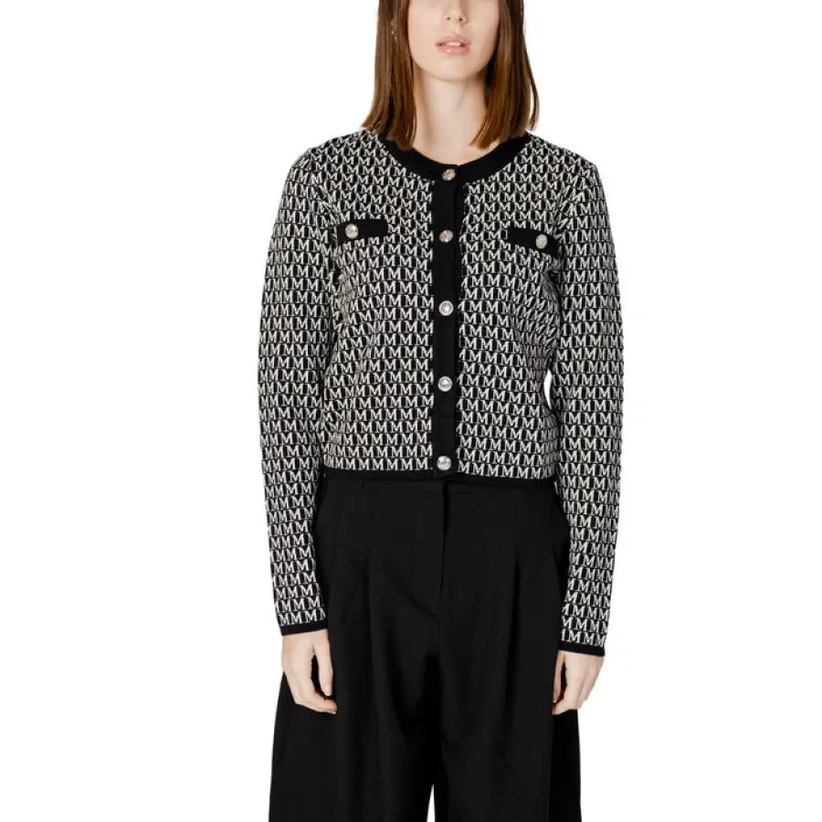 Urban style: Woman in black and white patterned Morgan De Toi Cardigan