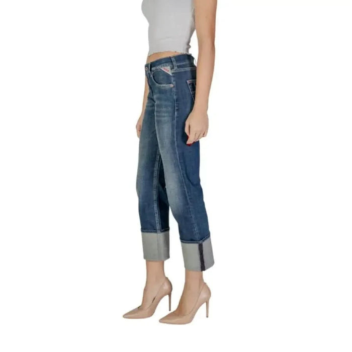 Woman showcasing Replay Women’s Blue Jeans with worn-out effect and nude heels