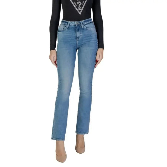 Woman modeling Guess Women’s Light Blue Jeans for Spring and Summer collection