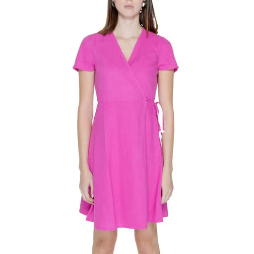 Urban style woman in Only pink dress - trendy women’s clothing