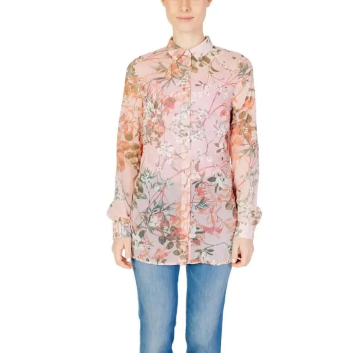 Woman in Guess women shirt, pink floral design - Guess Guess product showcase