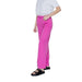 Woman in pink Only trousers and white shirt showcasing urban city style fashion