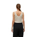 Vero Moda urban style clothing, woman in white top and black pants, urban city fashion