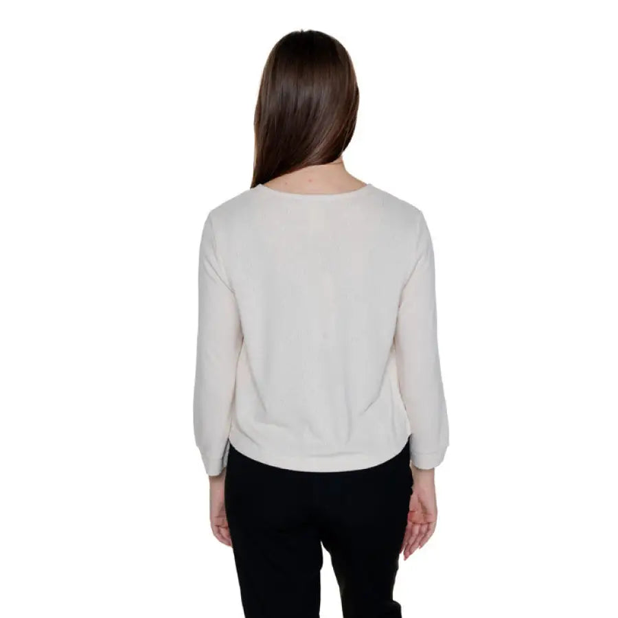 Woman in white long-sleeved top and black pants from behind - Street One Women Cardigan