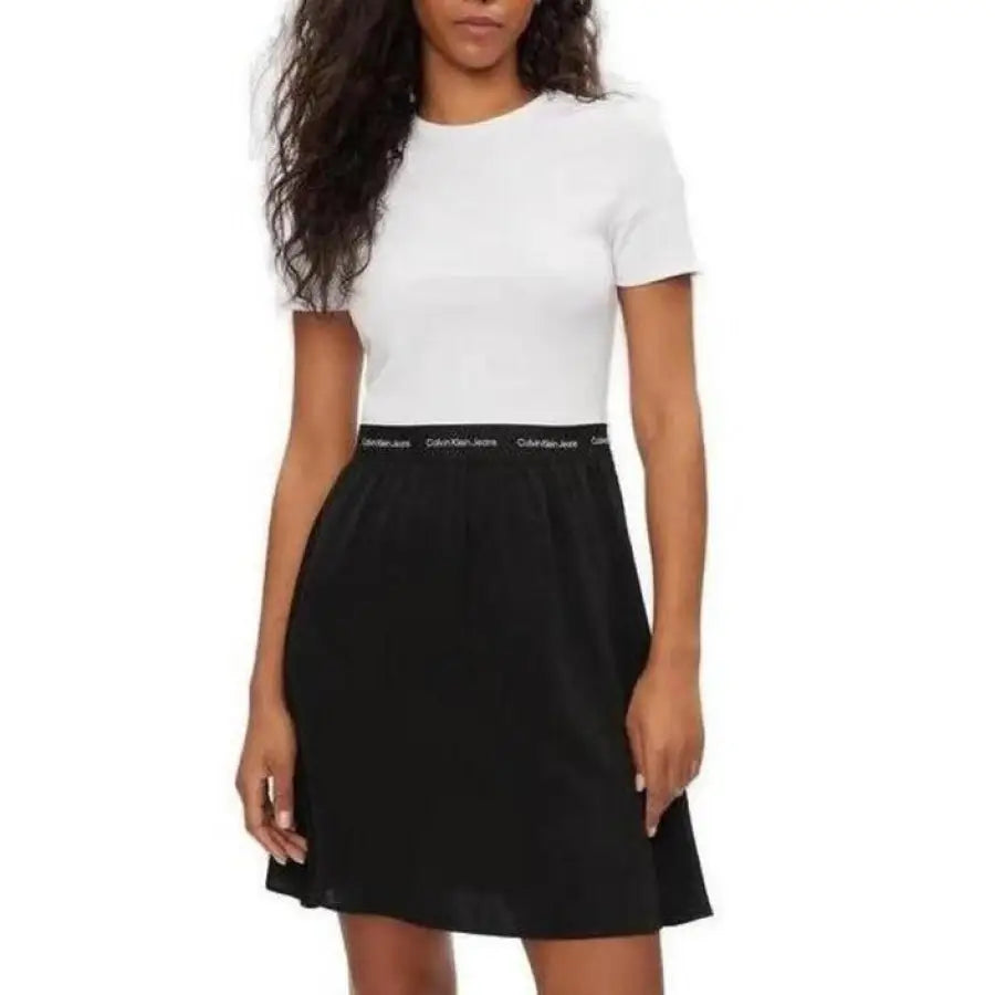 Woman in white t-shirt, black Calvin Klein skirt – Calvin Klein Jeans Women Dress