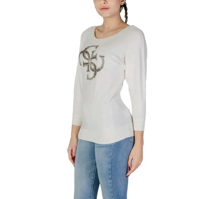 Woman’s long-sleeved white top with logo from Guess Women’s White Knit Sweater Round Neck