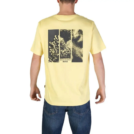 Yellow Boss Men T-Shirt featuring black graphic panels printed on the back