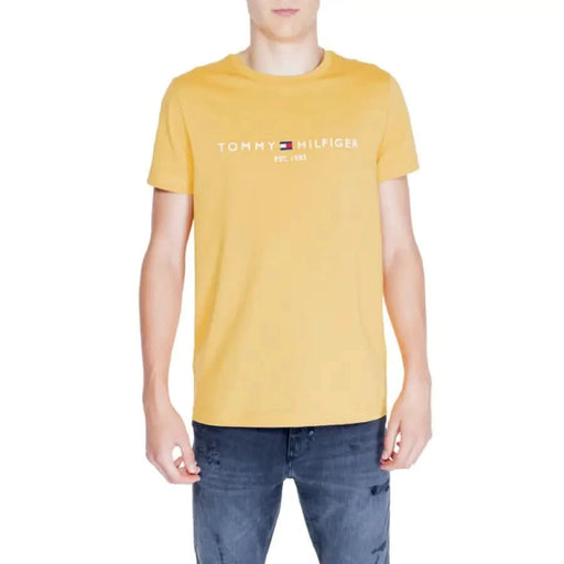 Yellow Tommy Hilfiger T-Shirt with White Logo Text from the Tommy Hilfiger Men T-Shirt Collection