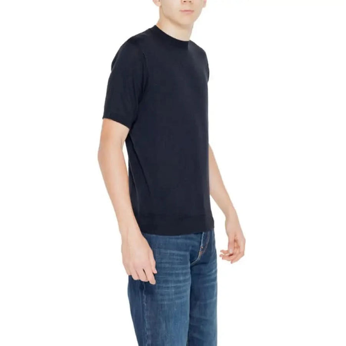 Young boy in black t-shirt from Hamaki-ho Men Knitwear collection